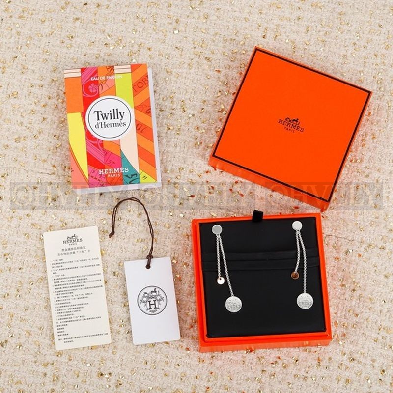 에르메스 Ex-Libris earrings